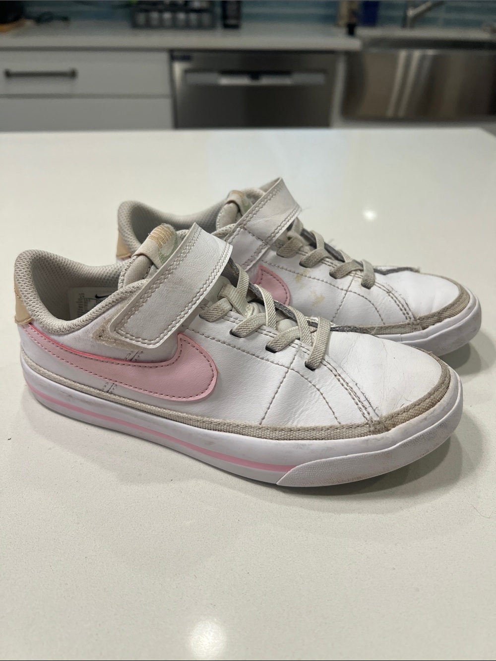 Nike Kids White Sneakers with Pink Swoosh